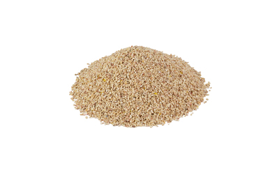 Pile of raw couscous on white background.