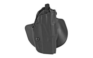 Black handgun in molded holster