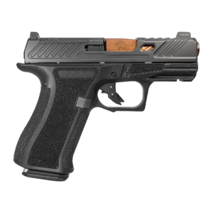 Close-up of semi-automatic pistol with copper barrel