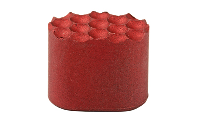 Red cylindrical cake with rounded top decorations