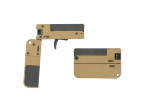 Compact folding firearm in two positions
