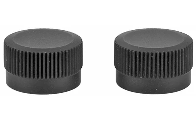 Two black plastic bottle caps with ridged edges.