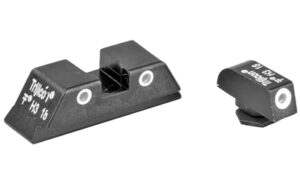 Black metal pistol iron sights with white dots
