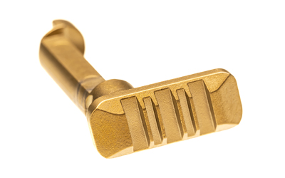 Shiny brass key on white background