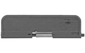 Gray metal door closer with exposed spring mechanism