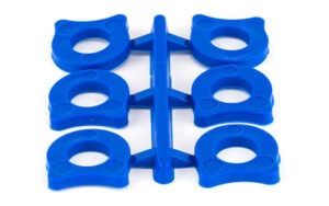 Blue plastic molded parts on sprue frame