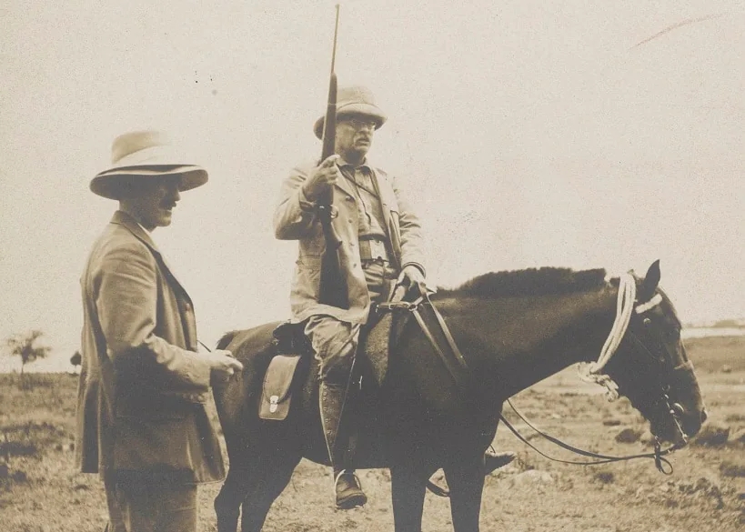 Theodore Roosevelt on horseback with his modified Springfield M1903